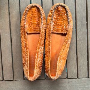 Orange feaux snake flats, size 7.5, good condition. Aerosoles.